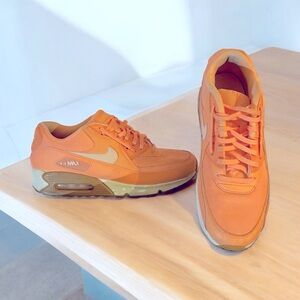 Orange Nike Air Max sneakers size 10